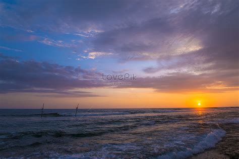 รูปชมพระอาทิตย์ตกที่ริมทะเล Hd รูปภาพวันหยุด ชายหาด ภูมิทัศน์ ดาวน์