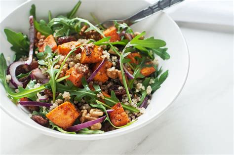 This sweet moroccan salad is prepared by simmering diced sweet potatoes or yams with cinnamon, turmeric, saffron, raisins and honey. Sweet Potato Quinoa Salad with Walnuts and Raisins