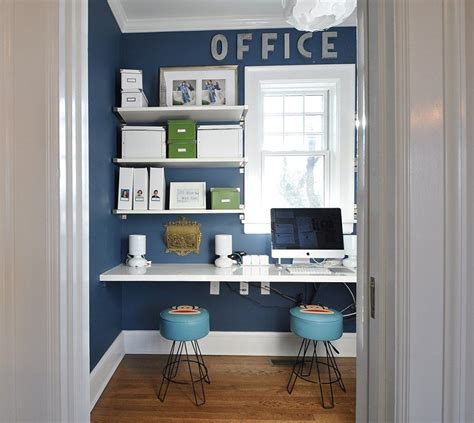 Small Home Office Design With Sleek Shelves In White And A Blue