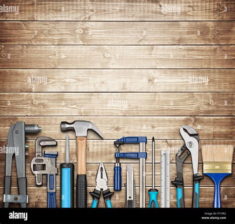 Various Carpentry Repairing Diy Tools On Wooden Background Stock