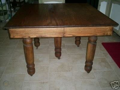 Yonkers extendable dining table cozy setting for a bright dining room, furnished with a long dining table made in a square shape out of oak wood with a dark tint and a fine polish. Antique Oak Square Dining Table / 5-Legged Farm Style ...
