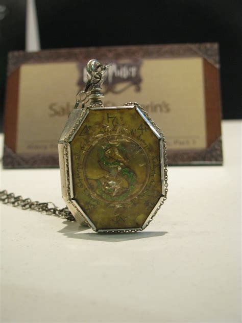 Contains two designs, one on each side of the locket (see pictures). Salazar Slytherin's Locket Horcrux from "Harry Potter and ...