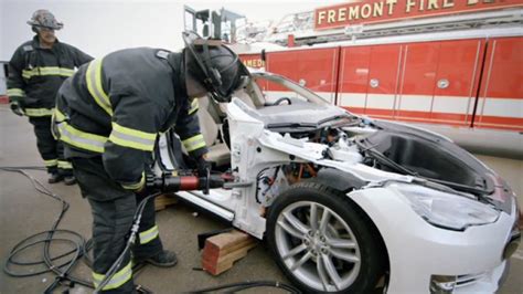 The tool they use to cut you outta your busted car after you smash it while smokin a blunt, drinking a brew, or running from the cops. Watch the Jaws of Life tear apart a Tesla Model S - Autoblog