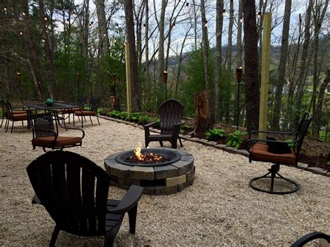 Mark the circular fire pit area, giving it an interior diameter of 3 to 4 feet if four people will sit around the pit. Our Patio ~ Pea gravel, Gas fire pit, cafe lights | Fire ...