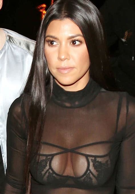 kourtney kardashian flashes cleavage in sexy bra and lucite sandals