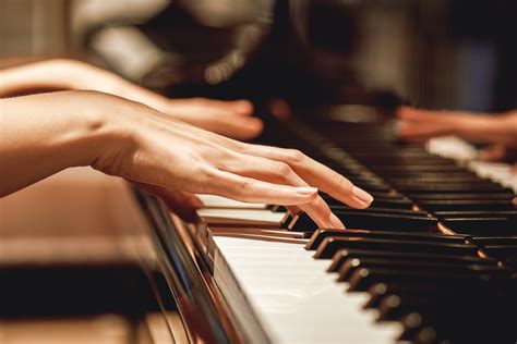 Favorite Classical Musicclose Up View Of Gentle Female Hands Playing A