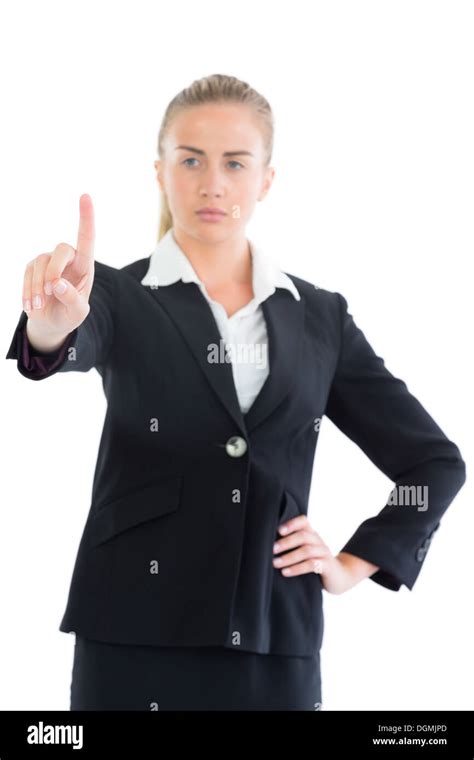 Focused Young Business Woman Pointing Upwards Stock Photo Alamy
