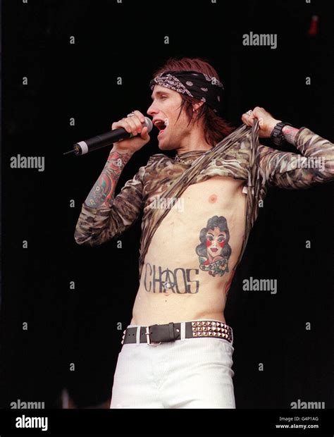 Lead Singer Band Buckcherry Performing On Stage Reading Music Festival