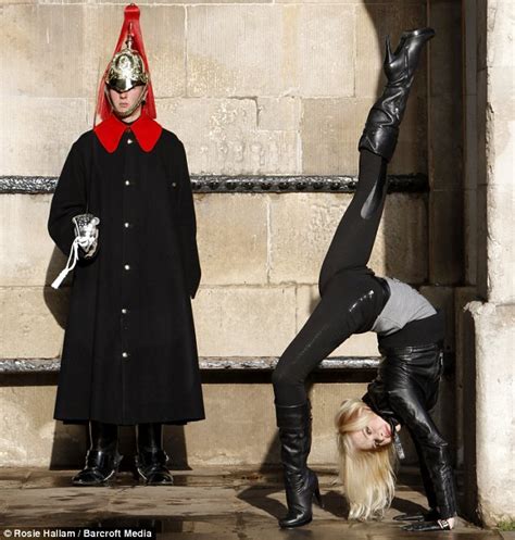 russian contortionist zlata causes a stir by wrapping herself around london landmarks daily
