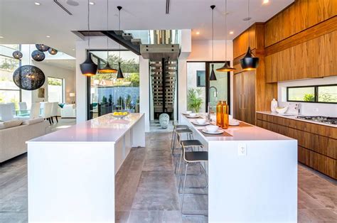 Islands are especially useful in luxury kitchens with open floor plans and can open up a dialogue between the kitchen and the living room, the cook and the guests. 25 Contemporary Two-Island Kitchen Designs Every Cook ...