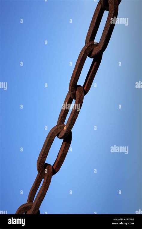 Rusty Iron Chain With Blue Sky Stock Photo Alamy