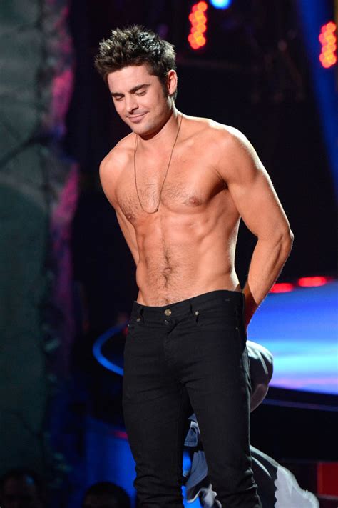 I love zac efron <3 and my goal is to meet him someday. Zac Efron goes shirtless in MTV Movie Awards