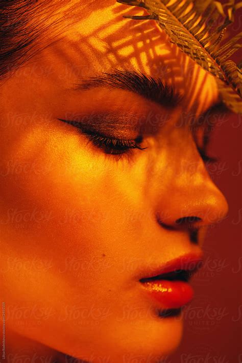 Tropical Themed Beauty Portrait In Warm Light By Stocksy Contributor
