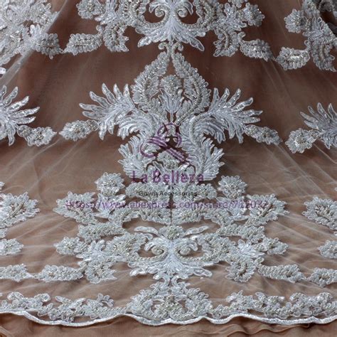 La Belleza Ivorywhite Large Pattern Cord Lace Fabric Heavy Beaded