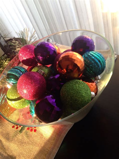 put ornaments in a glass container to add a little Christmas touch