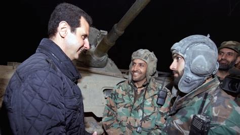 Syria S Bashar Al Assad Hugs Troops In Rare Public Appearance Cbc News
