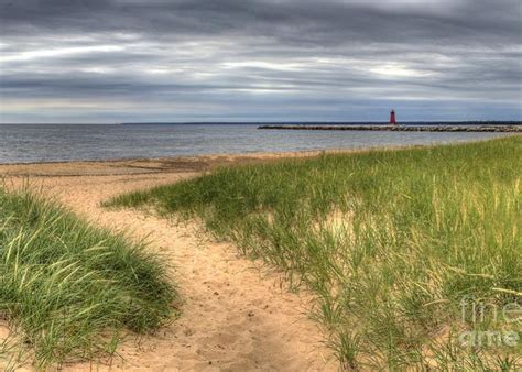 Manistique Beach And Lighthouse Photograph By Twenty Two North Photography