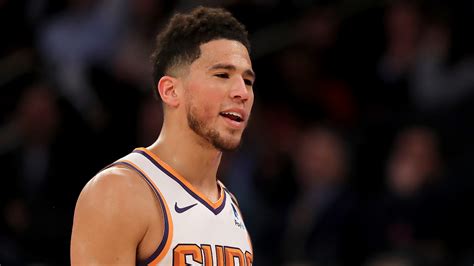 Here is devin booker's height, weight, age, body statistics. How long is Devin Booker out? Suns guard leaves OT loss with leg injury | SIKMIK