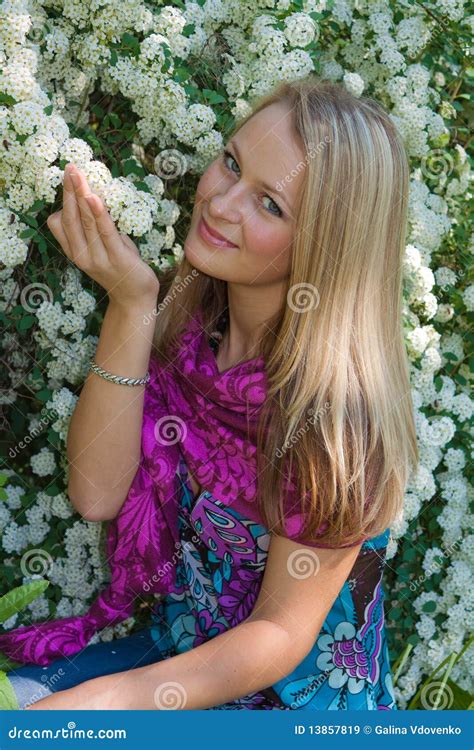 The Fair Haired Girl Sits In A Garden Stock Image Image Of Female Nature 13857819
