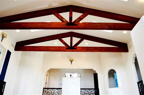 In many cases, a vaulted ceiling makes the room feel more open, bringing air and light into a room. Vaulted ceiling with exposed beam trusses - Mediterranean ...