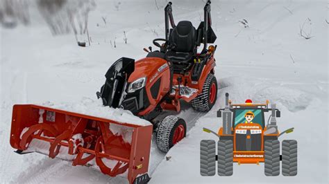 Kubota Tractor In The Snow Bx2380 With Snow Blower Youtube