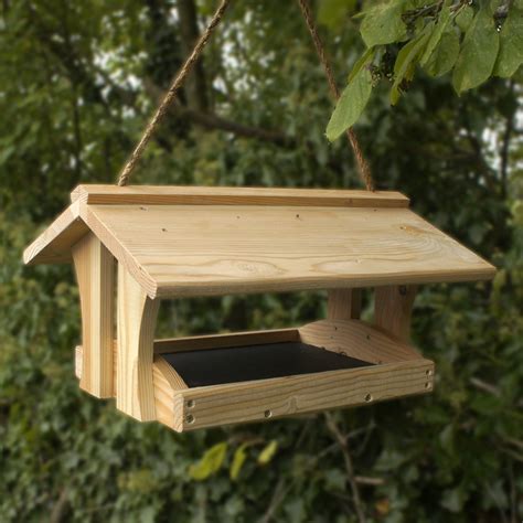 Cut the board and perch DIY Bird Feeders on Pinterest | Wooden Bird Feeders, Bird Feeders and Bird House Plans