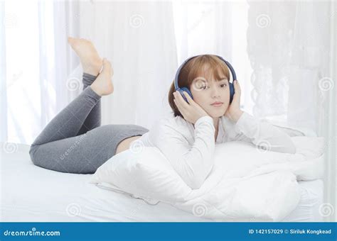 Sleeping Woman Listening To Music Happily Stock Image Image Of