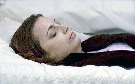 woman in her open casket during her funeral caskets funeral casket funeral