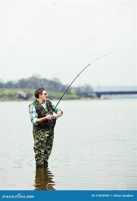 Fisherman Angling On The River Stock Photo Image Of Leisure