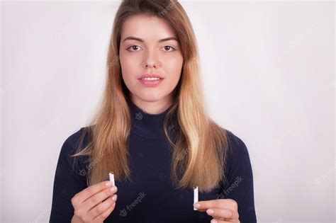 Premium Photo Beautiful Woman Holding Broken Cigarette Quitting