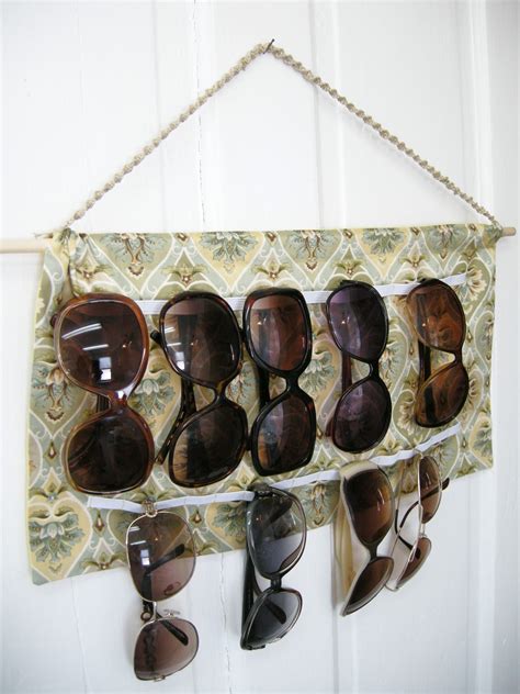The size of the middle hole is critical as it needs to fit the 1/2. DIY Sunglasses Holder - CafeMom
