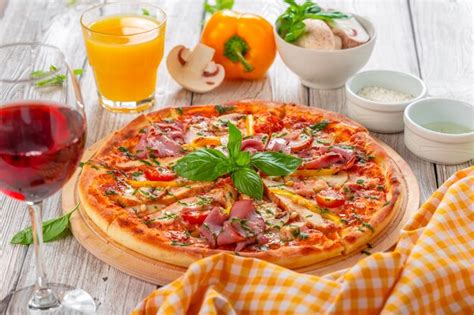 Premium Photo Delicious Fresh Pizza Served On Wooden Surface Table