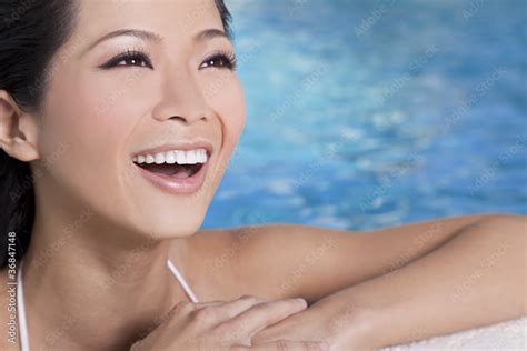 Beautiful Sexy Chinese Oriental Asian Woman In Swimming Pool Stock
