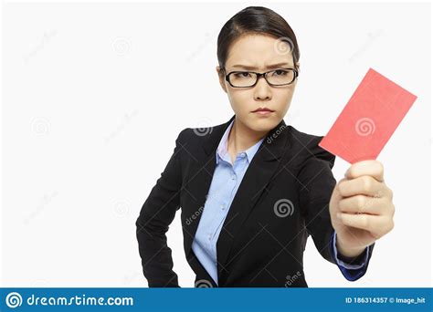 Angry Businesswoman Holding Up A Red Card Stock Image Image Of Side