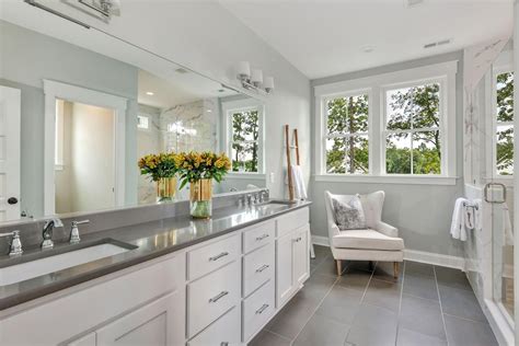Master Bath With Gray Floor Tiles White Cabinets Gray Quartz