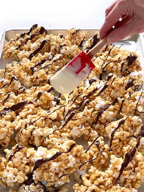 Maybe you would like to learn more about one of these? suzis-toffee-popcorn-with-chocolate-drizzle-recipe-pan
