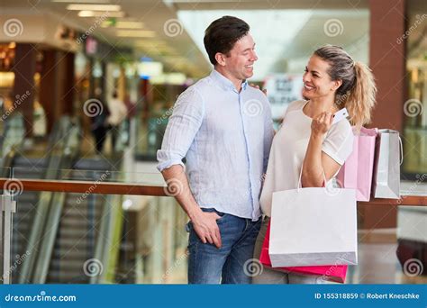Couple In Shopping Mall While Shopping Stock Image Image Of Woman
