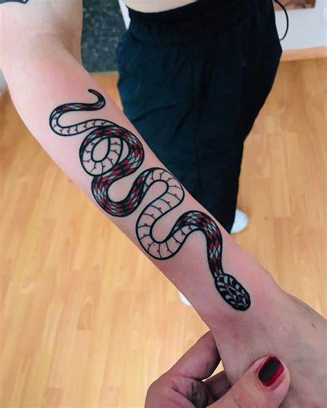 In fact, you really can't go wrong getting arm tattoos for men. Snake on a forearm by tattooist Alejo GMZ - Tattoogrid.net