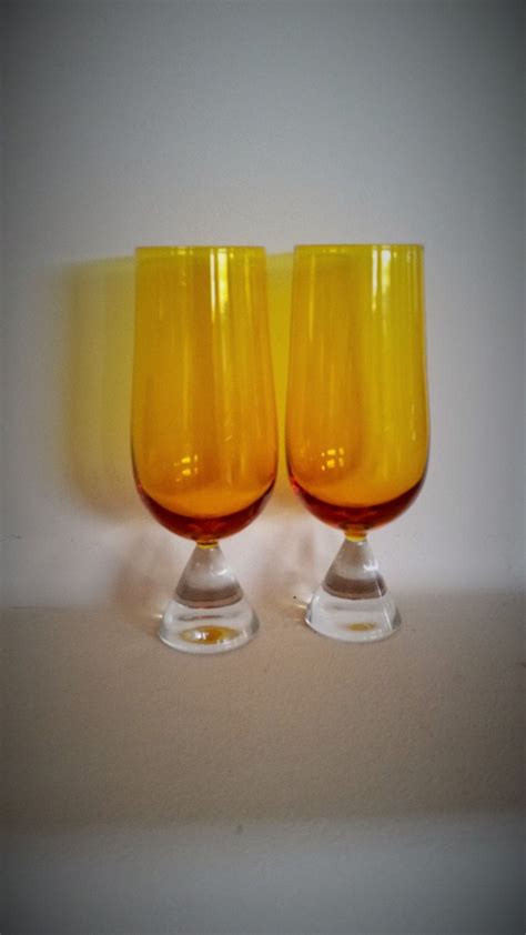 Mid Century Amber Stemware Goblets With Clear Crystal Bases Etsy Stemware Amber Glass
