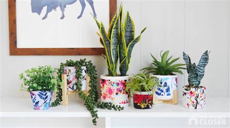It dries hard, making the surface more stiff. How to Make Easy Mod Podge Flower Pots with Fabric - One ...