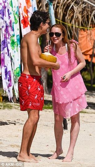 I care about my muffins. Lindsay Lohan sports swimsuit during Mauritius romp with fiancé Egor Tarabasov | Daily Mail Online