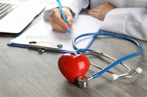 Medical Concept With Doctor Stethoscope And Heart Stock Photo By