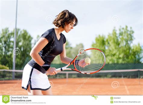 Beautiful Young Girl On The Open Tennis Court Stock Image