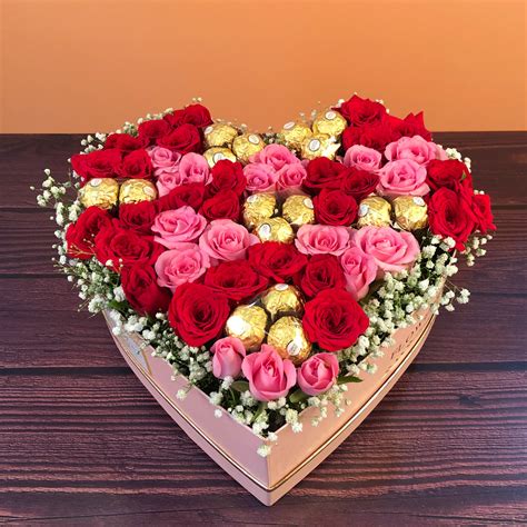 Heart Shaped Arrangement Of Roses And Chocolates In A Box Shamuns Flowers
