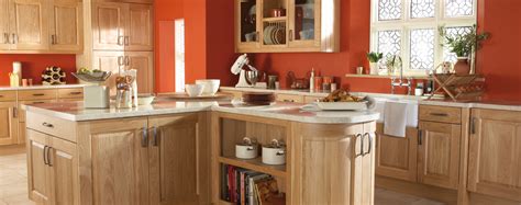 Cerused oak cabinetry, with mostly lower cabinets. Kitchen Cabinets Bromsgrove | Kinsale Natural Oak