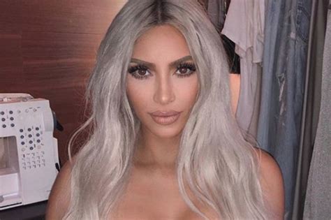 Kim Kardashian Flaunts Her Blonde Wig As She Poses For Pictures With