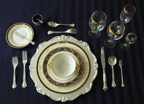 A service plate (also known as a charger in america) is a purely decorative, oversize plate used to add texture, color, or pattern to the table. Formal place setting with oyster fork on the right and ...