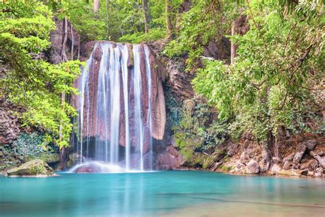 Waterfall And Emerald Lake In Tropical Forest Erawan Thailand Stock