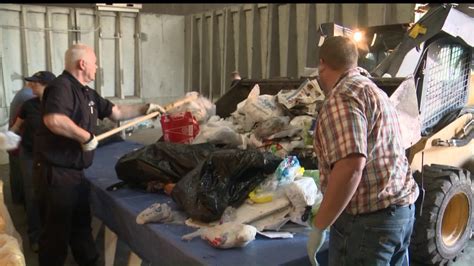 Ames Volunteers Are Digging Through Trash