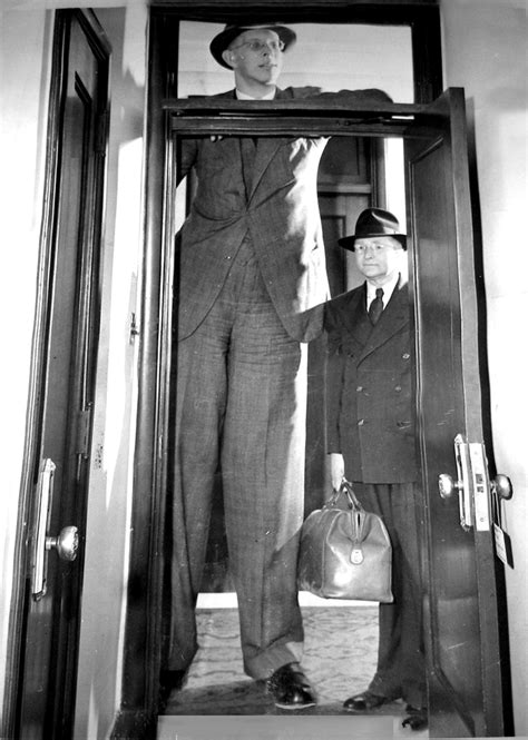Robert Wadlow Is 8 Feet 9 12 Inches Tall His Father Is 5 Feet 11 12